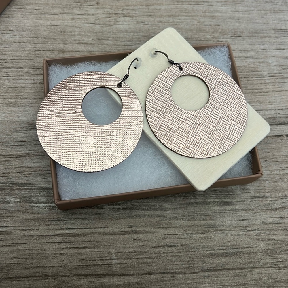 Nickel and Suede lightweight leather earrings new in box never worn